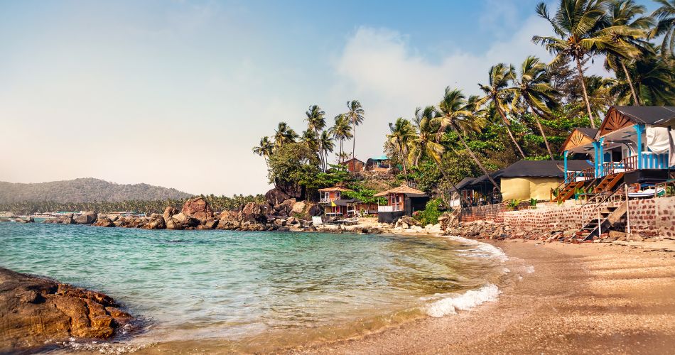 Candolim Beach with its serene shores and golden sands, renowned for its scenic beauty in Goa.