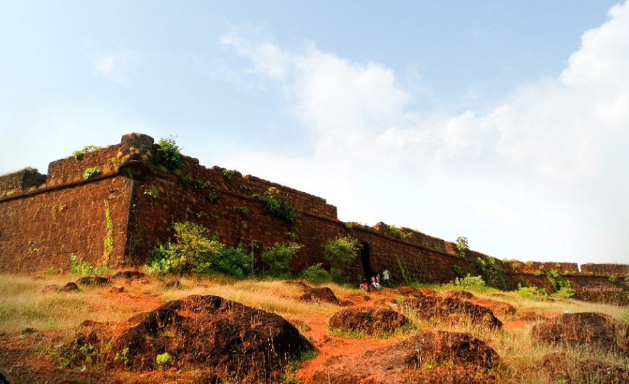 Chapora Fort, a must see tourist attraction in Goa overlooking scenic landscapes.